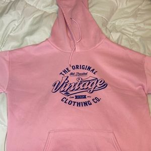 Light pink hoodie, super warm and really soft material on the inside